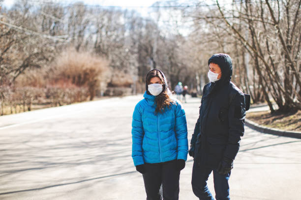 istock Young People With Face Protection Mask 1214043627