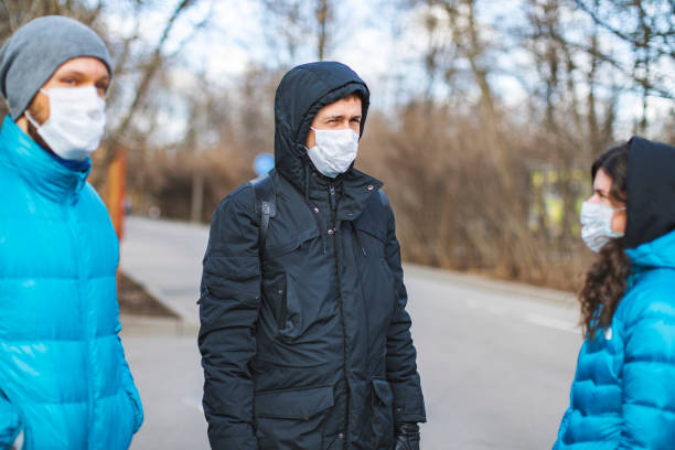 istock Young People With Face Protection Mask 1214043676