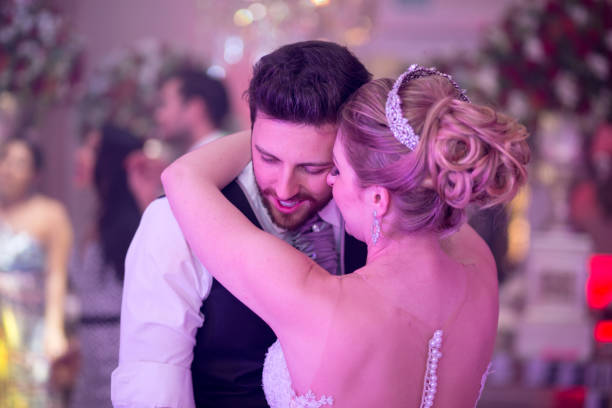 istock Bride and groom dancing at wedding party 1214045612