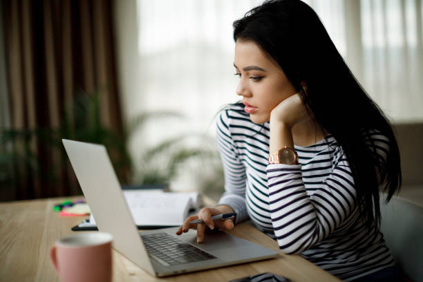 istock Young woman working at home 1214046440