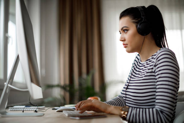 istock Young woman working at home 1214046656