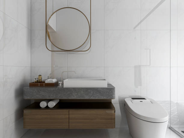 istock 3D rendering, modern residential clean bathroom design, with washbasins, mirrors, toilets, shower equipment and bathtubs 1214046958