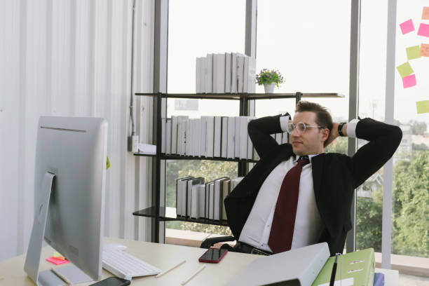 istock Young businessman is relaxing in his office. 1214047863