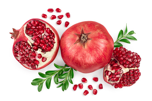 Pomegranate isolated on white background with clipping path and full depth of field. Top view. Flat lay.