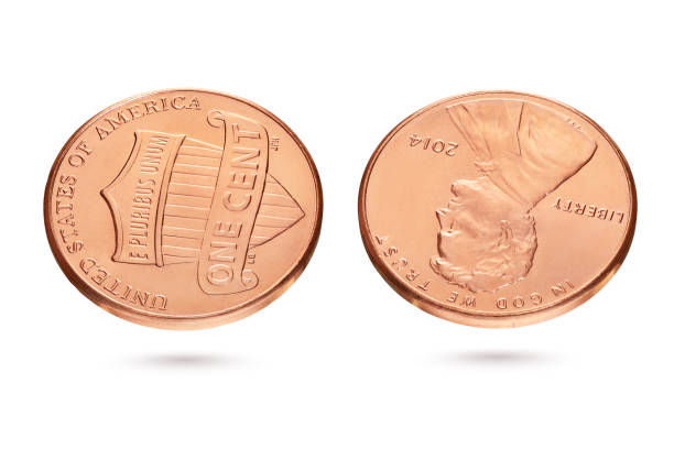 istock Both sides of one US cent or penny isolated on white 1214053619