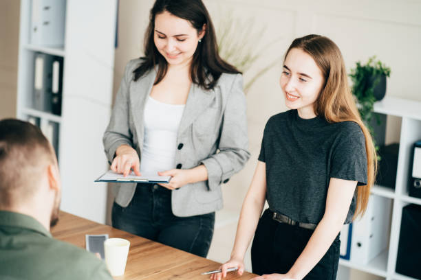 istock Recruiters checking male candidate, job interview 1214056656