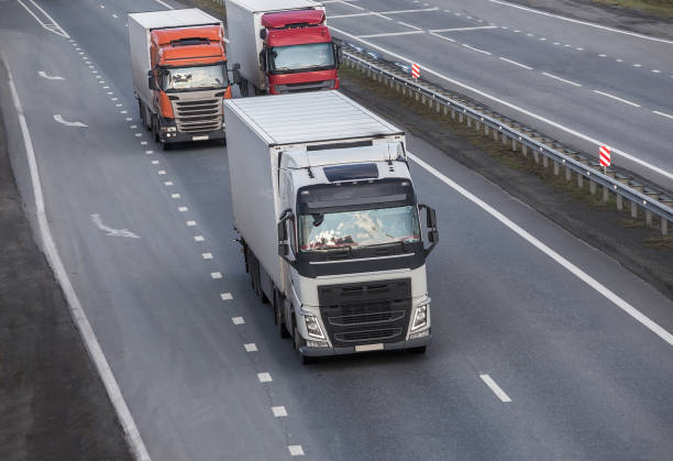 istock trucks goes on the highway 1214057264