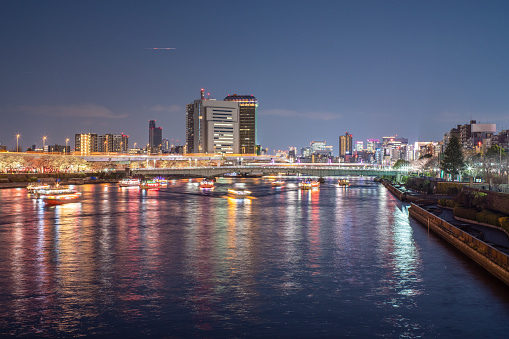 Tokyo, Japan skyline on the Sumida River at night