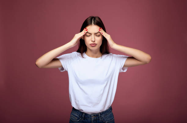 istock Young female in depression looking sick and tired of work. 1214060674