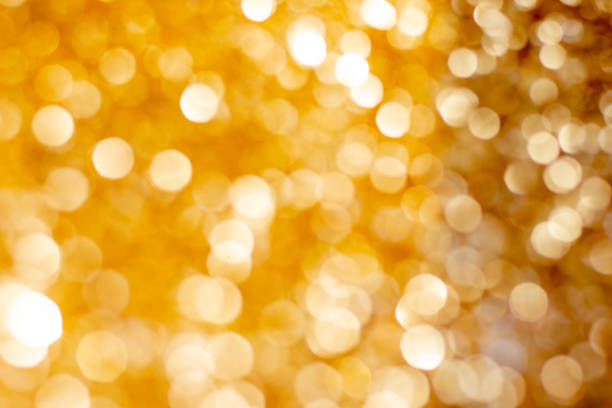 istock Golden silver glitter bokeh blurred abstract background overlay 1214061822