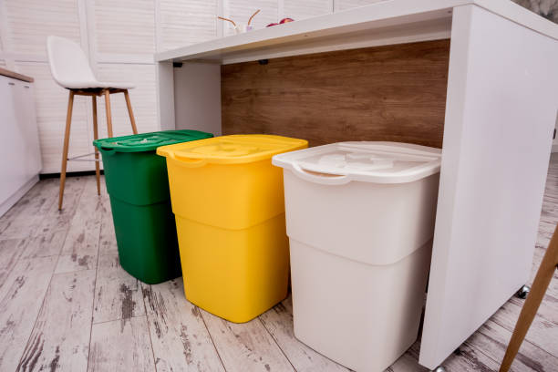 istock Recycle bins in the kitchen. Household waste sorting. 1214063591