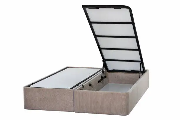 Pull up storage bed, storage space revealed by lifting the slatted base, isolated on white background, include clipping path.