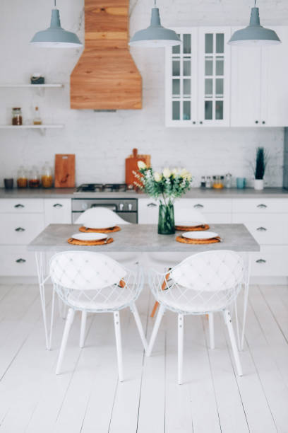 istock Slow living lifestyle concept. Kitchen interior and table setting. Scandinavian style. 1214064716
