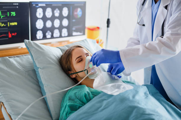 Infected patient in quarantine lying in bed in hospital, coronavirus concept. An infected patient in quarantine lying in bed in hospital, coronavirus concept. sick woman hospital bed stock pictures, royalty-free photos & images