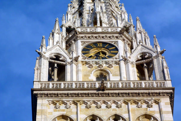 istock Zgreb Cathedral stone tower detail with blue sky 1214067255