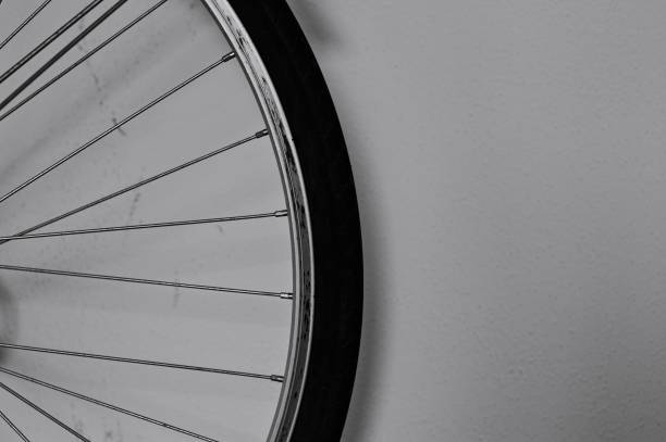 istock Bicycle wheel against a dirty wall in the garage (Pesaro, Italy, Europe) 1214067640