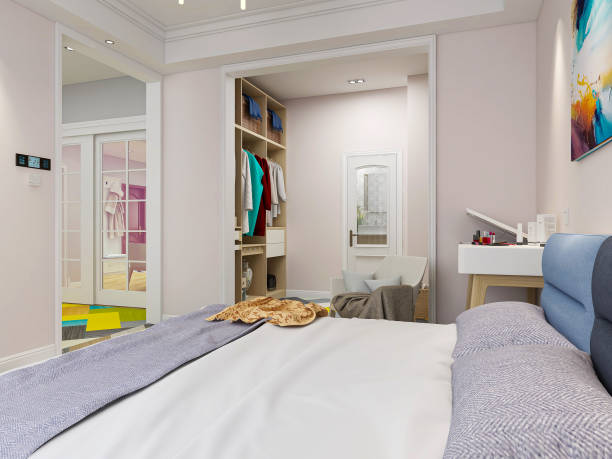 istock .3D rendering, elegant and spacious bedroom design in modern apartment, dressing room next to large bed, dressing table and green plants 1214067797