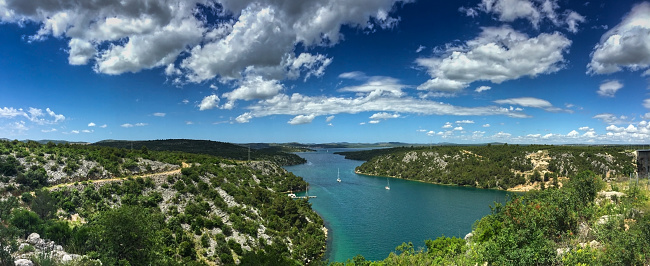 Looking down to world famous Krka river estuary. Krka National Park is a vast and primarily unaltered area of exceptional natural value, including one or more preserved or insignificantly altered ecosystems of Dalmatia region in Croatia.