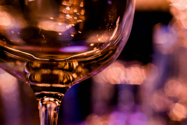 istock Wine and martini glasses in shelf above a bar rack in restaurant. 1214070020