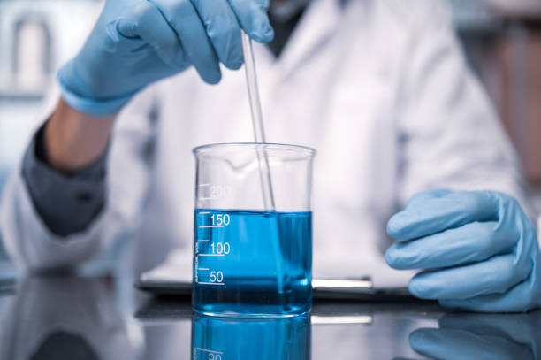 istock In a Modern Laboratory Research Scientist Conducts Experiments by Synthesising Compounds 1214070452