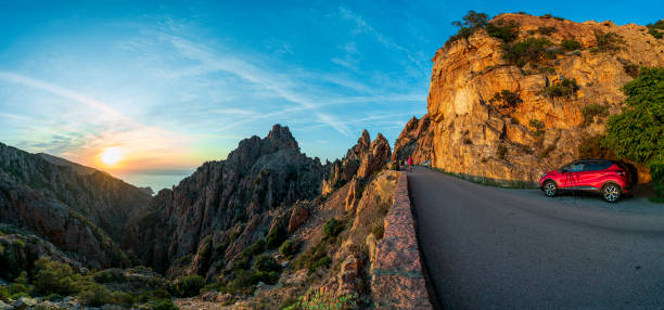 Panoramic image of coastal road high above along the Calanques of Piana
