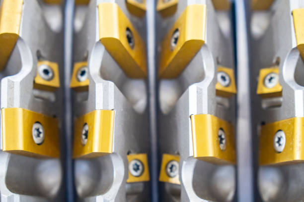 istock The roughing cutter with chip for CNC milling machine in close up scene. 1214073651