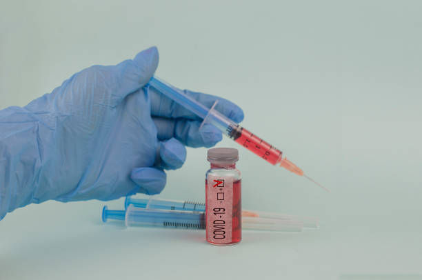 istock test with coronovirus c in epidemic with test tube 1214073680