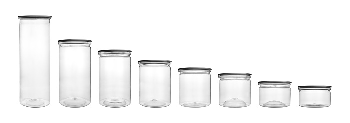 Collection set of empty transparent PET can jar for canning and preserving isolated on white background.