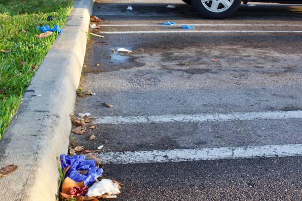 istock discarded latex gloves on ground, in parking lot 1214075706
