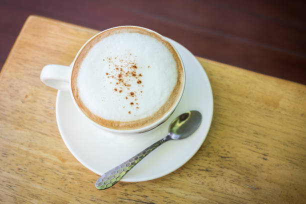 istock Top view of hot cappuccino coffee cup. 1214075711