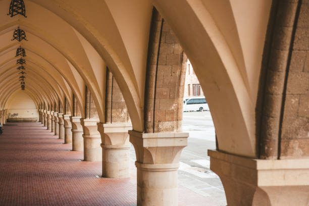 istock Historical building corridor passage with arches at Rhodes, Greece 1214075932