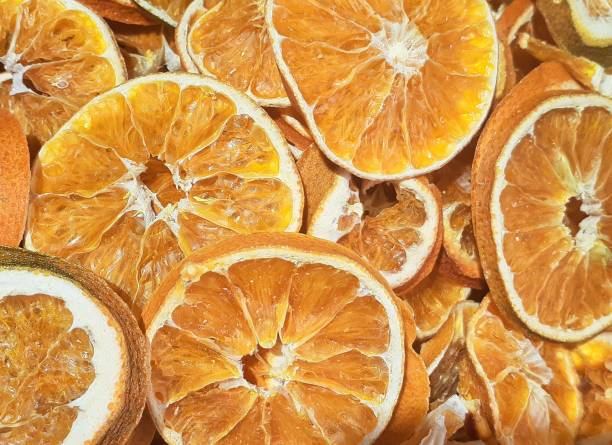 istock Oranges chips background. Flat lay for creative food design photo 1214077151