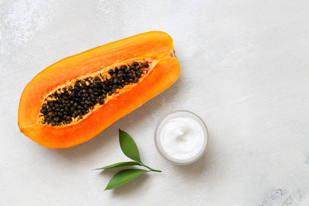istock Moisturiser cream and sliced papaya 1214078028