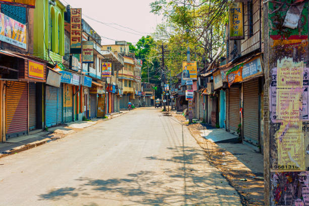Markets closed and roads empty for janta curfew lockdown Gobardanga,West Bengal,India-March 22,2020: Markets closed and the roads empty for janta curfew lockdown to protect the public during Coronavirus or Covid-19 epidemic. curfew stock pictures, royalty-free photos & images