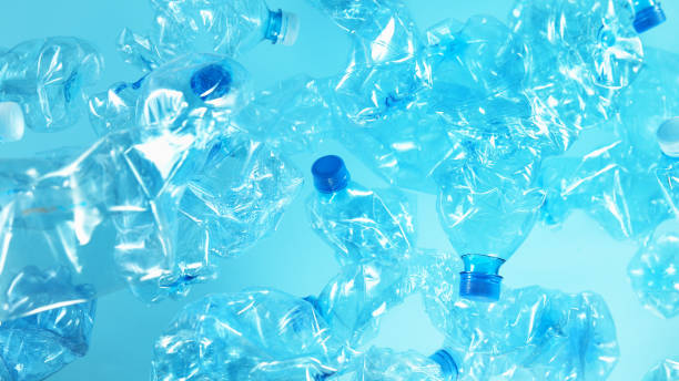 istock Pile of flying empty plastic bottles 1214079756