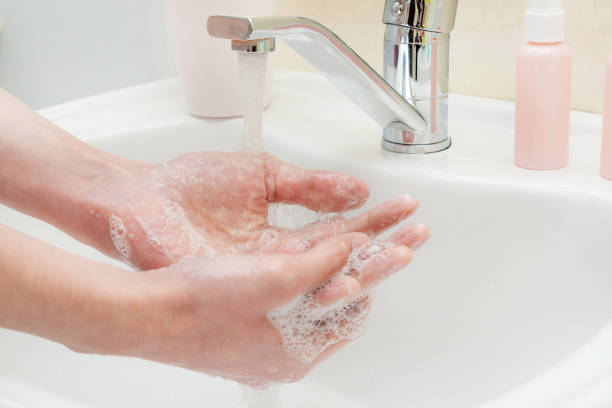 istock Washing hands with soap and water. Antibacterial protection and self-care. 1214079761