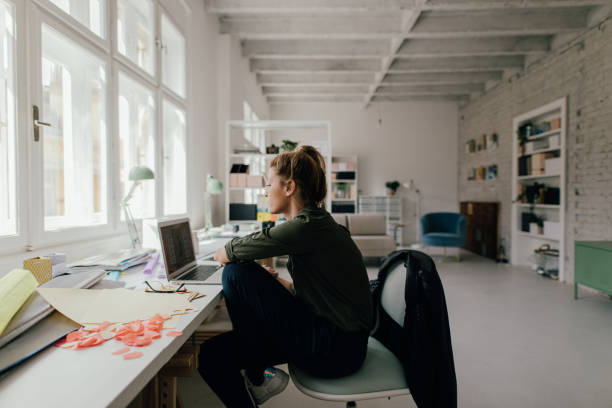 istock Finishing work online from home office 1214082777