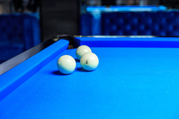istock Billiard balls on the table during the game 1214095810