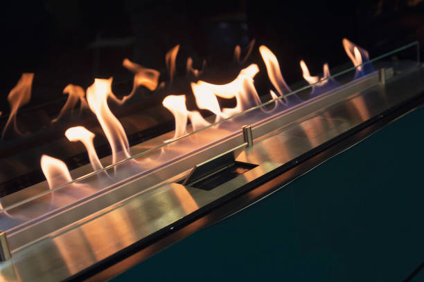 istock The flames in electric fireplace close-up. Interior 1214096094