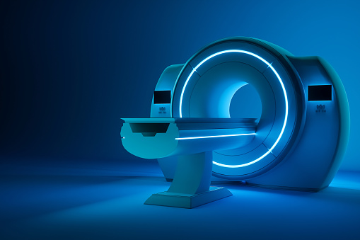 Máquina de resonancia magnética, máquina de imágenes por resonancia magnética sobre un fondo azul oscuro. Concepto de medicina, tecnología, futuro. Renderizado 3D, ilustración 3D, espacio de copia. photo