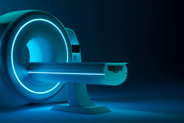 istock MRI machine, magnetic resonance imaging machine on a dark blue background. Concept medicine, technology, future. 3D rendering, 3D illustration, copy space. 1214097318