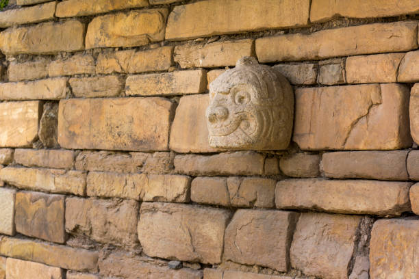 Cabeza Clava or pre-incan sculpture in Peru A Nail head (Cabeza Clava) or zoomorphic face carved in stone  from the pre-incan culture Chavin in Ancash Region, Peru huari stock pictures, royalty-free photos & images
