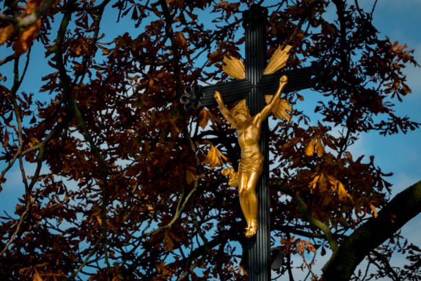 istock A roadside cross standing by the road among Moravian fields 1214098187