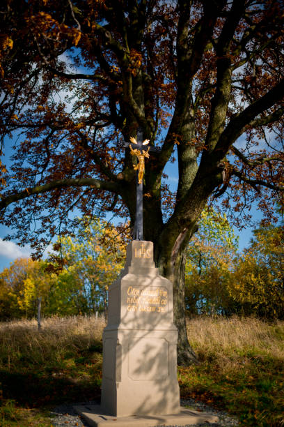 istock A roadside cross standing by the road among Moravian fields 1214098518