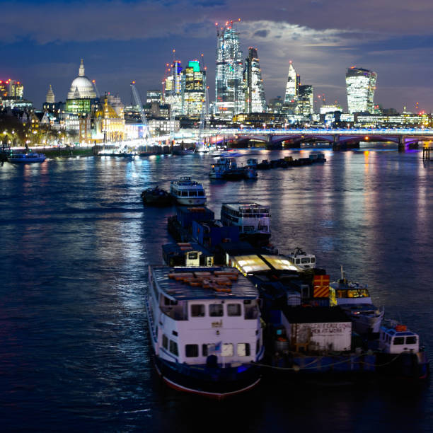 Rain in the evening accross Waterloo Bridge