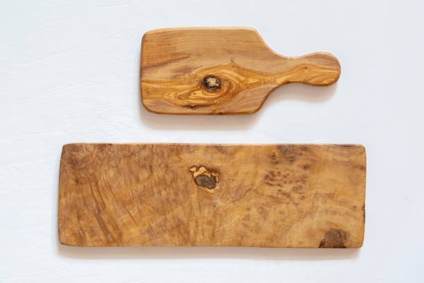 istock Kitchen boards made of natural olive wood on a white background. 1214099651