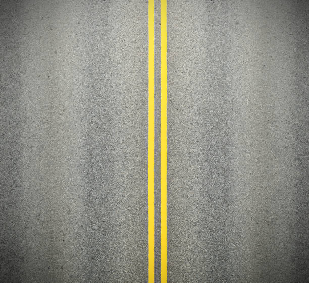 istock Asphalt road and double yellow lines 1214100114