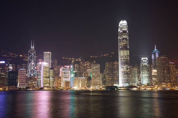 istock Victoria Harbor Skyline Hong Kong at night 1214100977