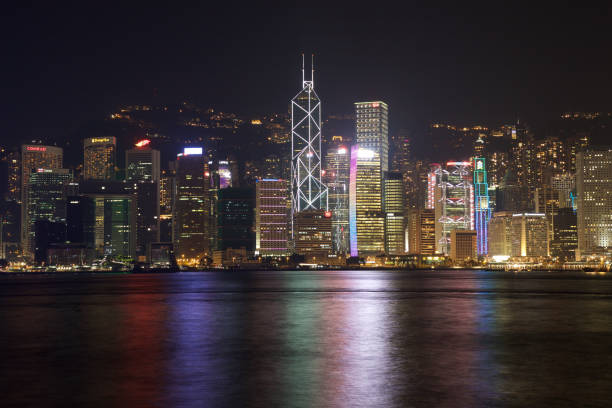istock Victoria Harbor Skyline Hong Kong at night 1214100990