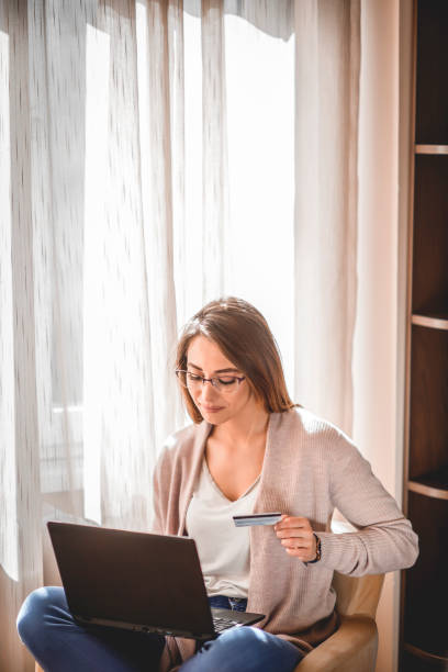 istock Beautiful women shopping online 1214101273